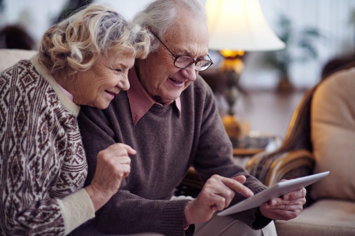Senior couple networking