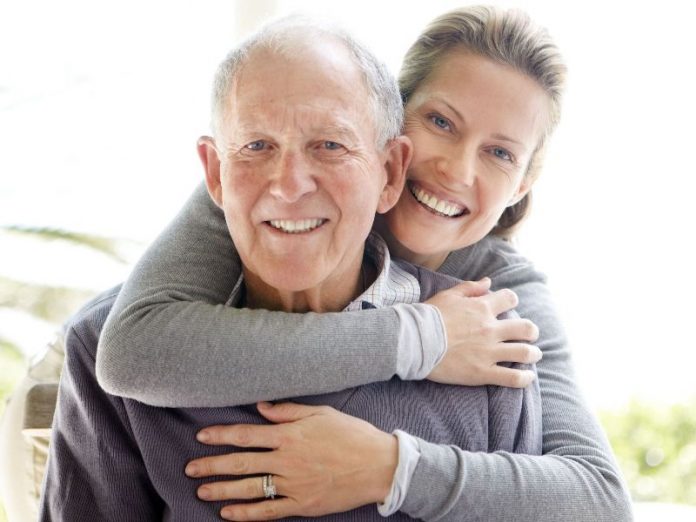 daughter-hugging-elderly-dad-purchased