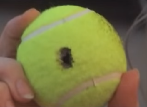hole-in-tennis-ball